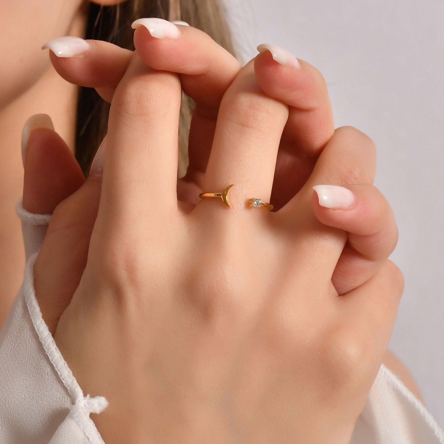 14K gold open crescent moon diamond ring worn on hand