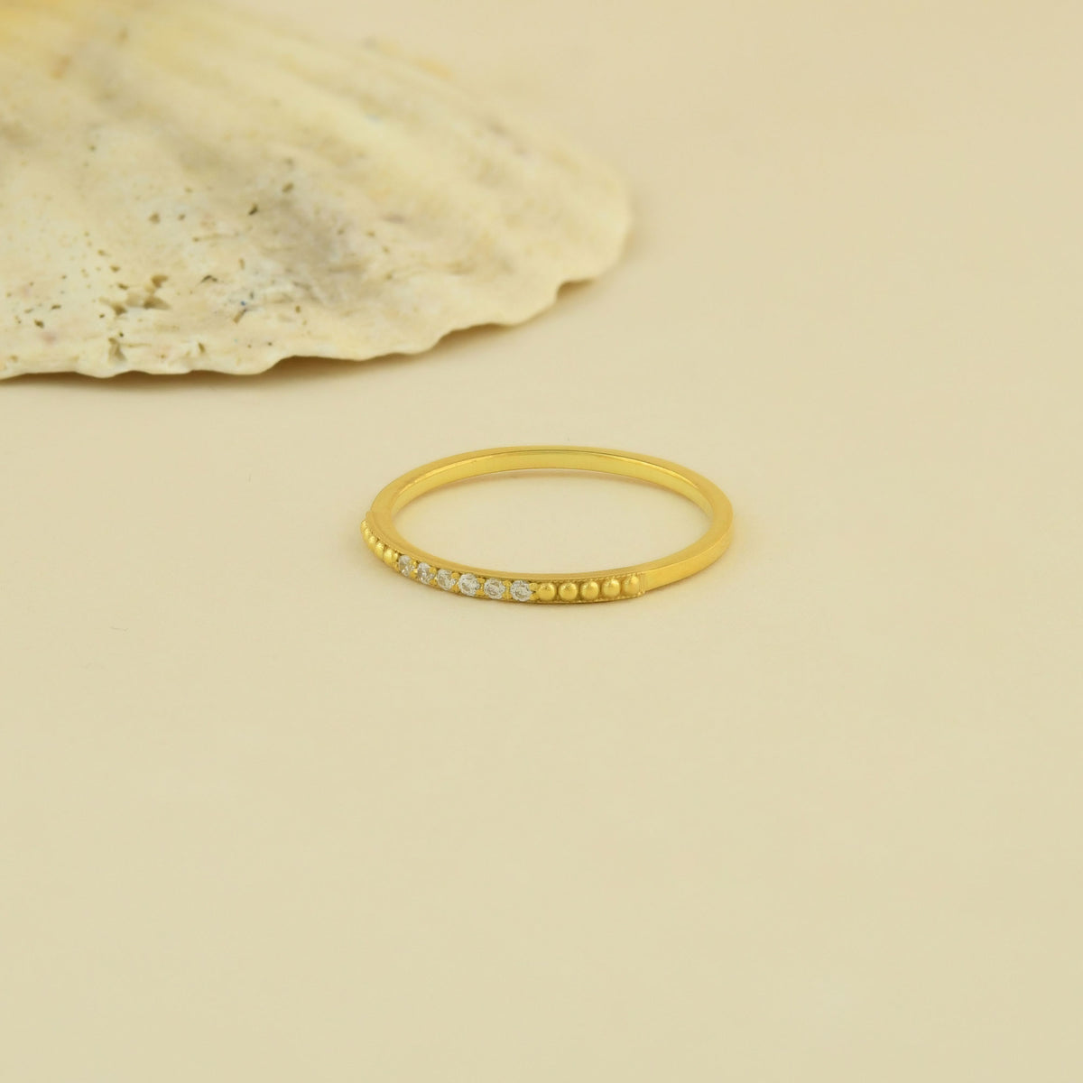 10K gold beaded milgrain diamond ring on display
