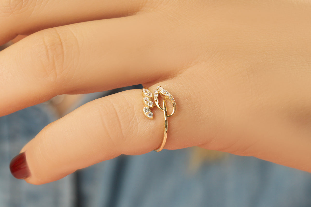 14K gold leaf ivy diamond ring worn on hand, side view
