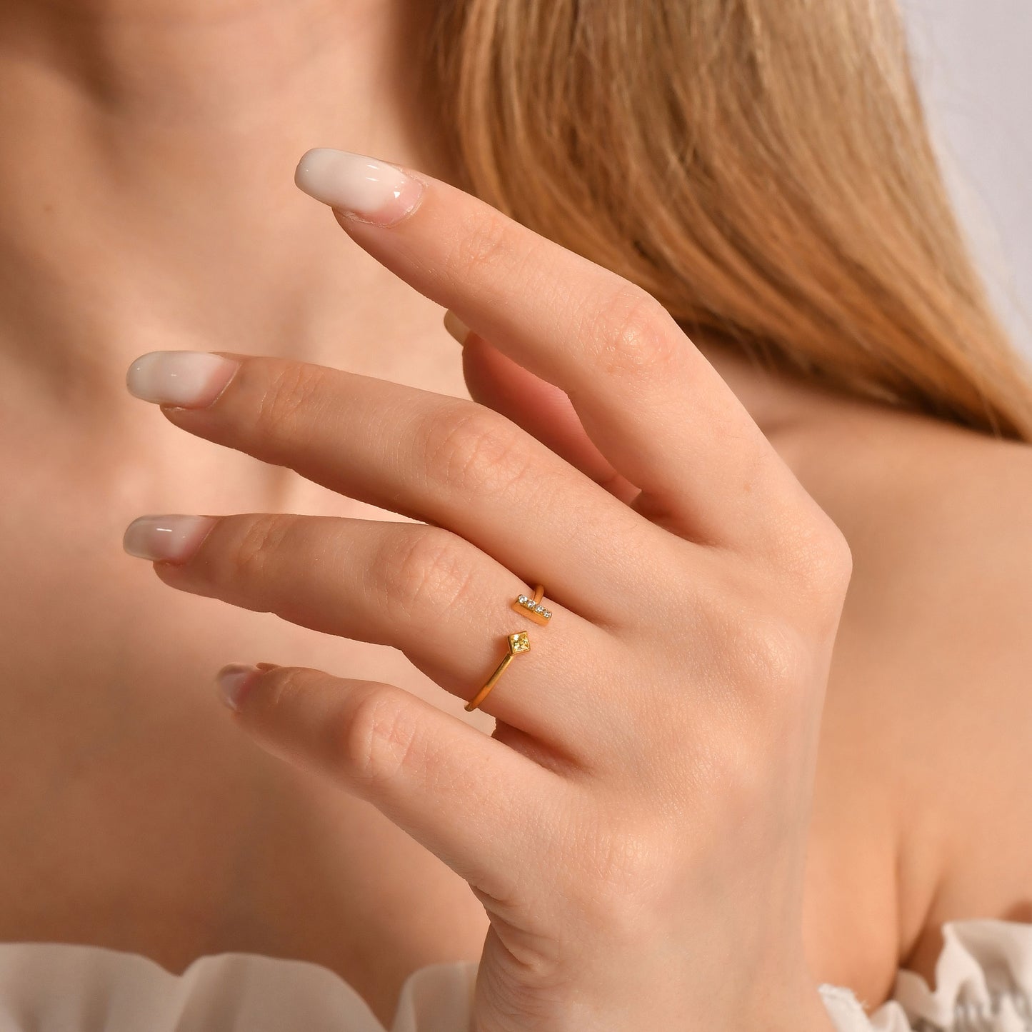 10K gold yellow-stone open bar diamond ring worn on hand