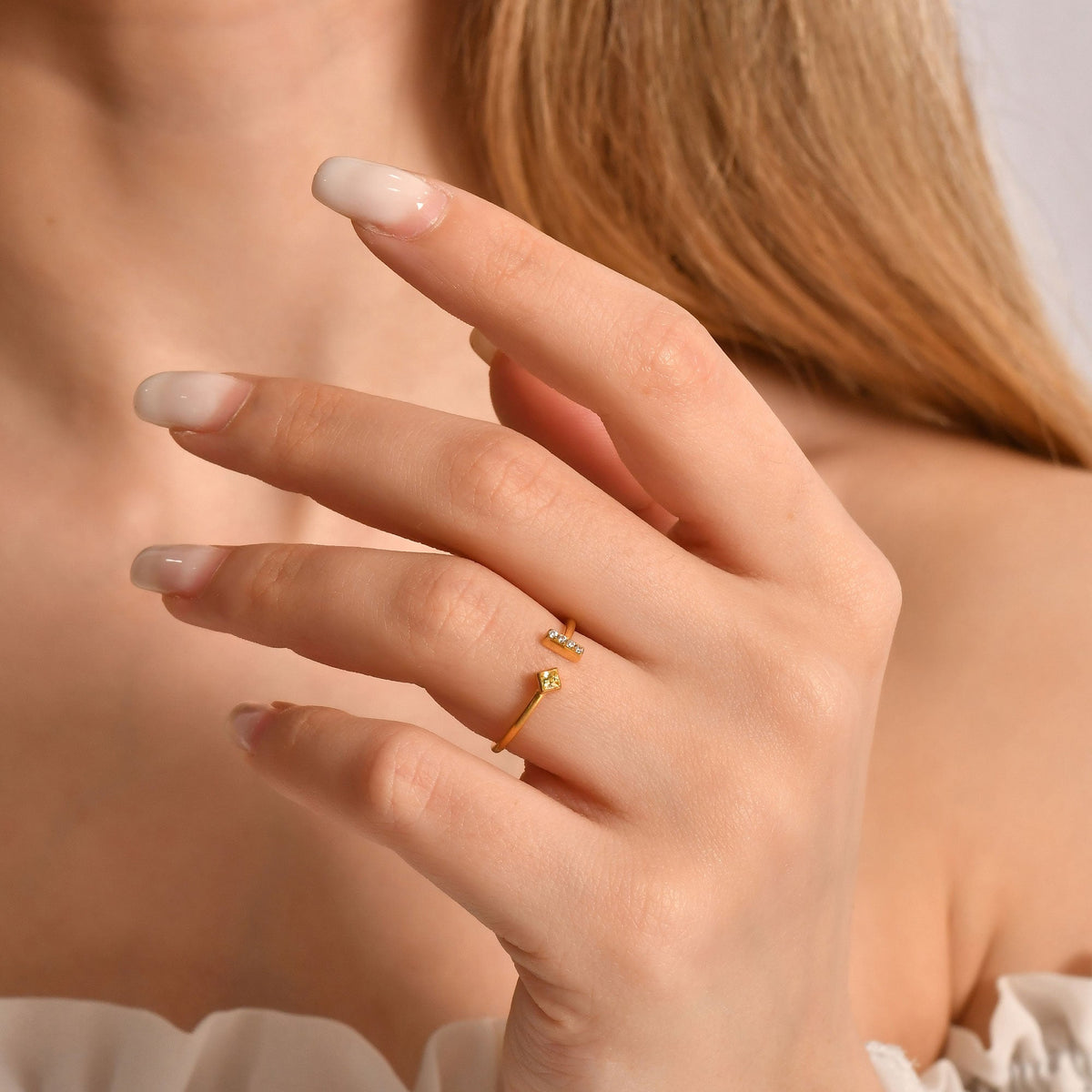18K gold yellow-stone open bar cubic zirconia ring worn on hand