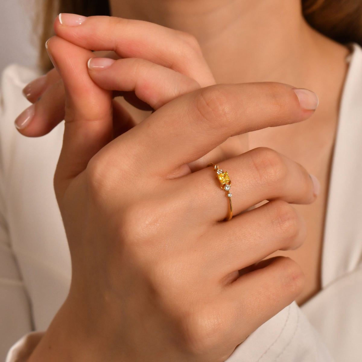 18K gold yellow-stone princess cubic zirconia ring worn on hand