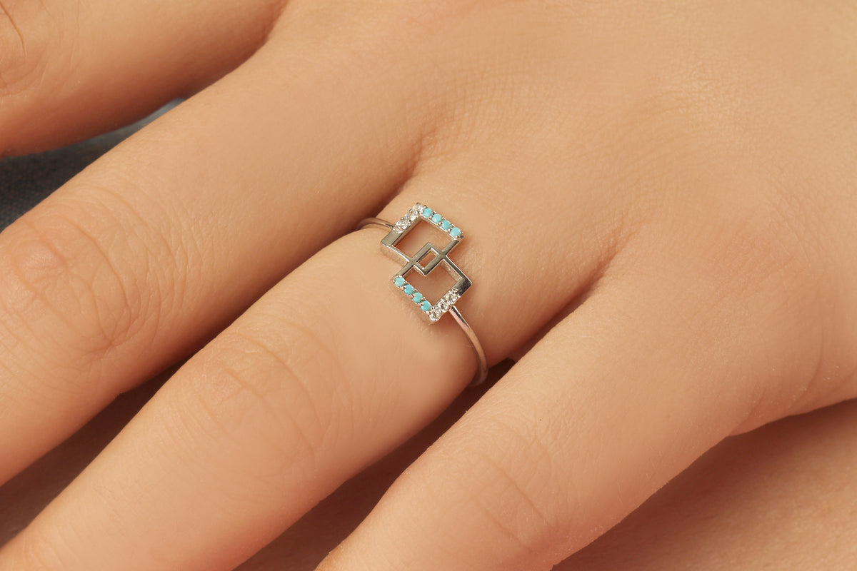 10K gold geometric square ring with turquoise stones and natural diamonds worn on hand, side view