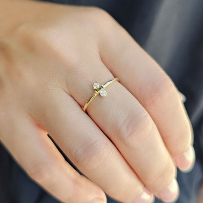 18 Karat Goldring mit Peridot und Zirkonia im Baguetteschliff – 2S35PER